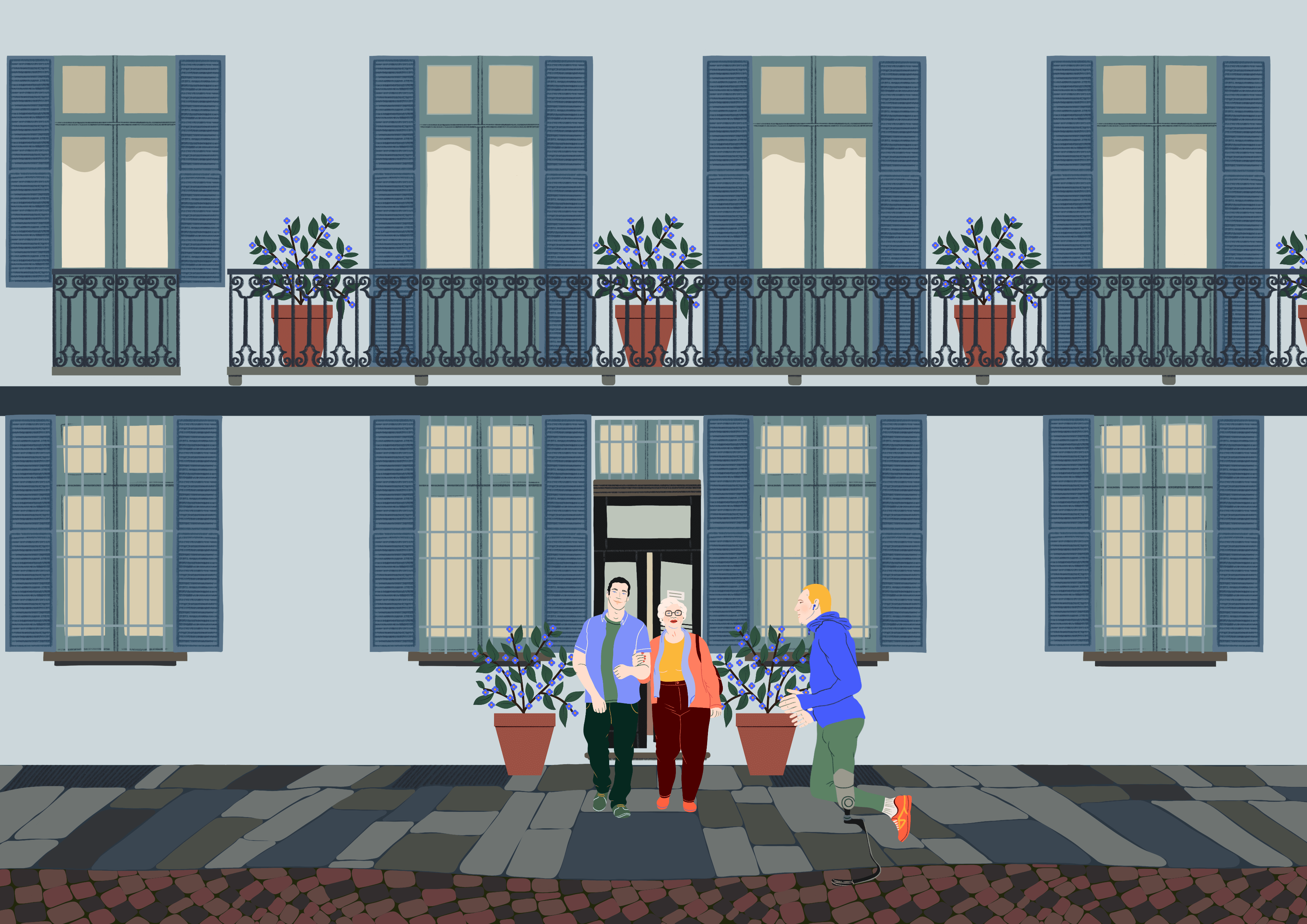 Studio notarile Cigliano con decorazioni primaverili di sera. Due persone passeggiano davanti all'ingresso.